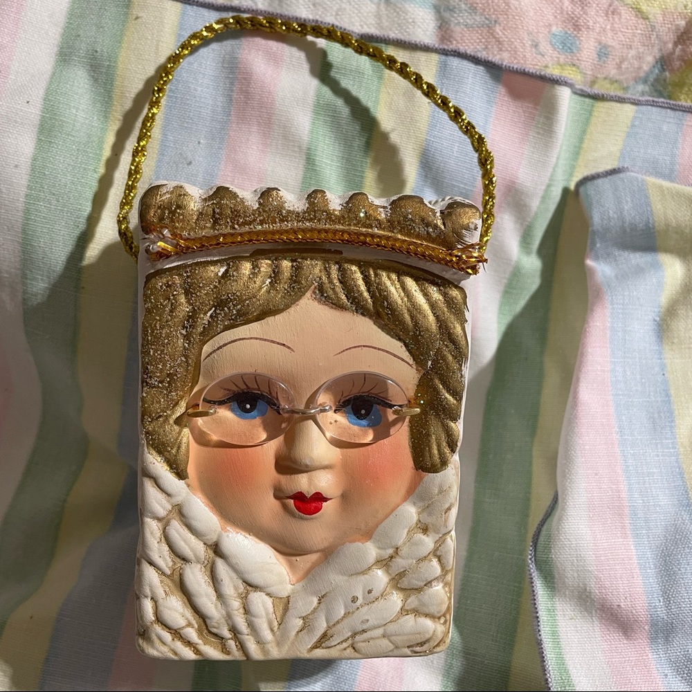 Collectible Bag looks like an Older Angel with glasses & handle made of plaster